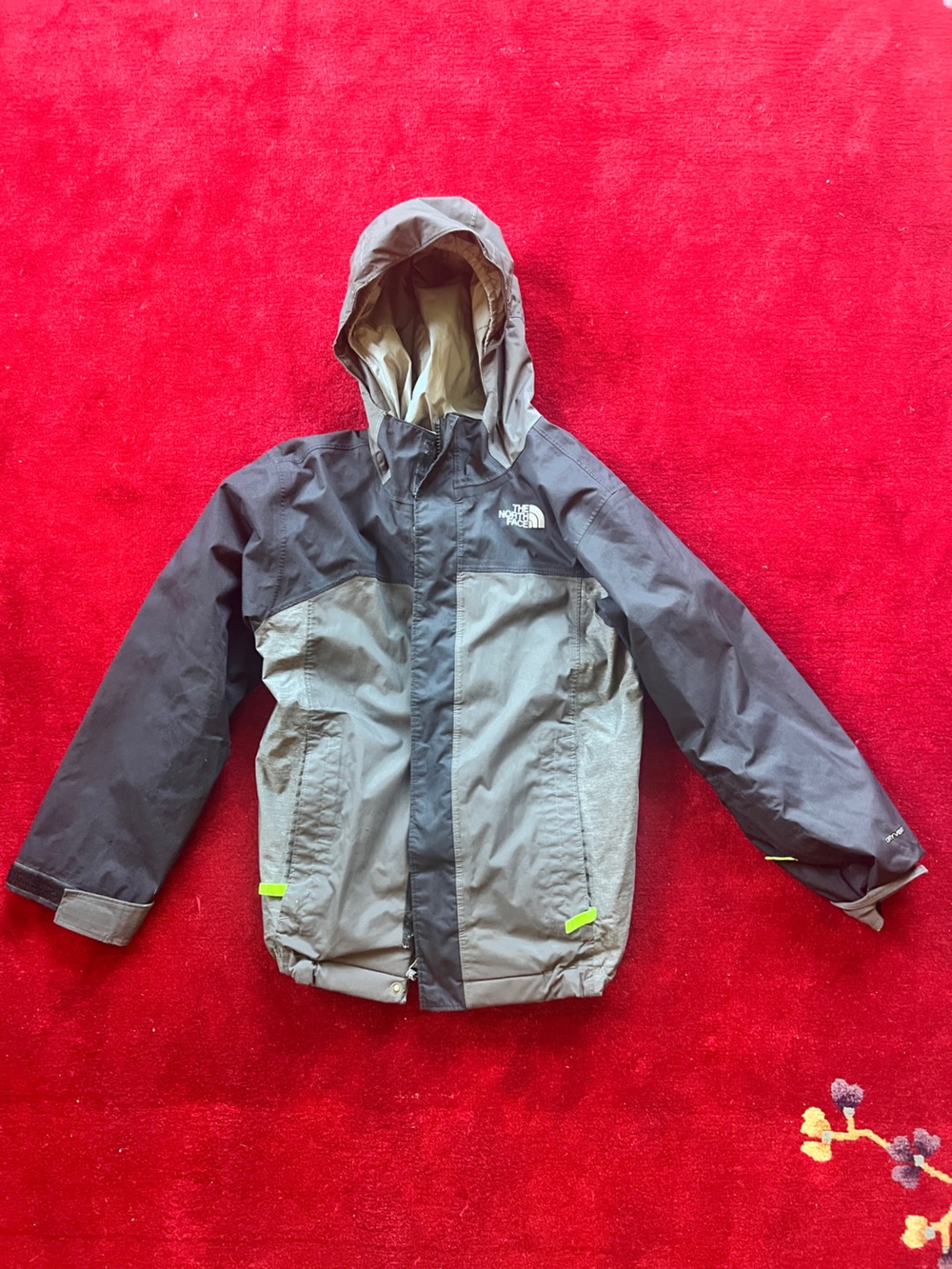 The North Face Kids' Two-Tone Black and Gray Raincoat with Lime Accents
